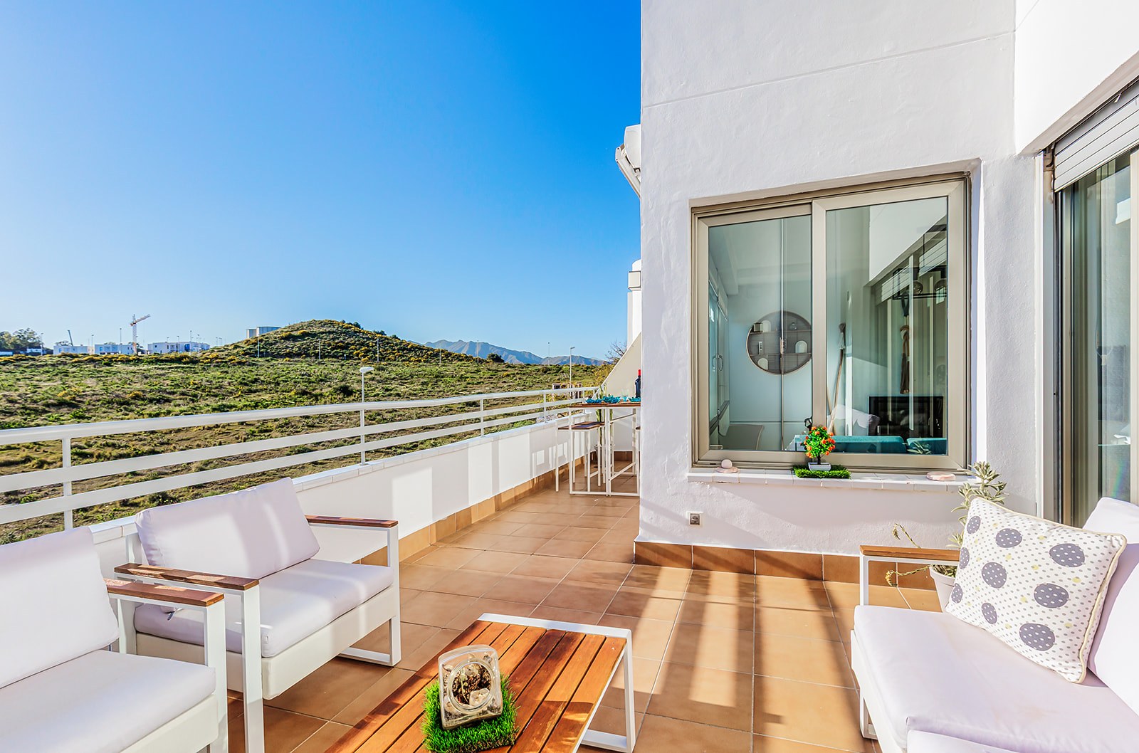 Terraza dúplex Cala de Mijas — fotografía inmobiliaria Costa del Sol